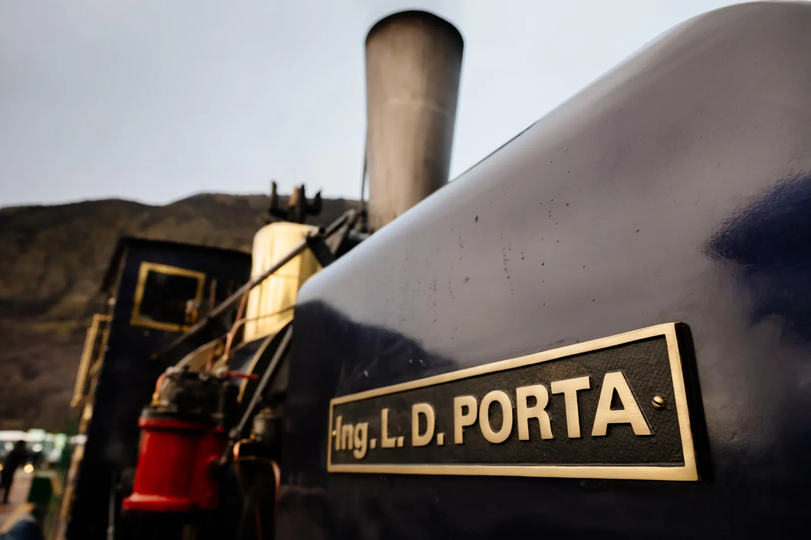 Brass nameplate reading Ing. L.D. Porta on the side of a steam locomotive