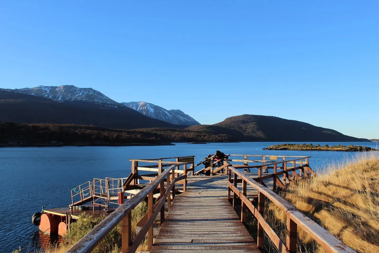 Wooden boardwalk leading to a lookout over Lapataia Bay